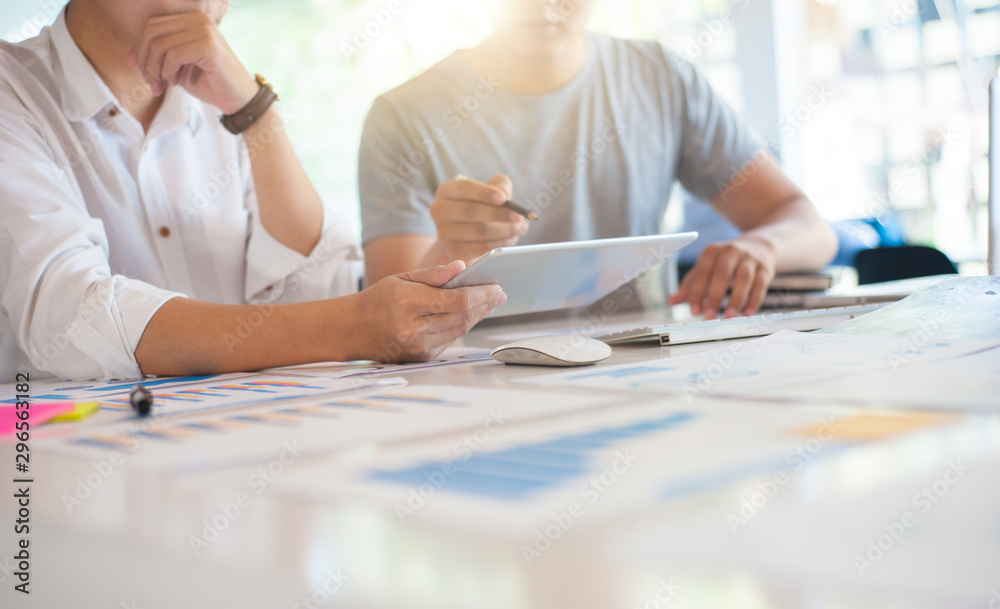 Analysis and consulting for business planning, finance and investment. Young business people are discussing the marketing strategy model planning.
