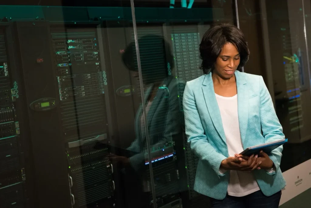 IT professional inspecting enterprise data servers in a data centre