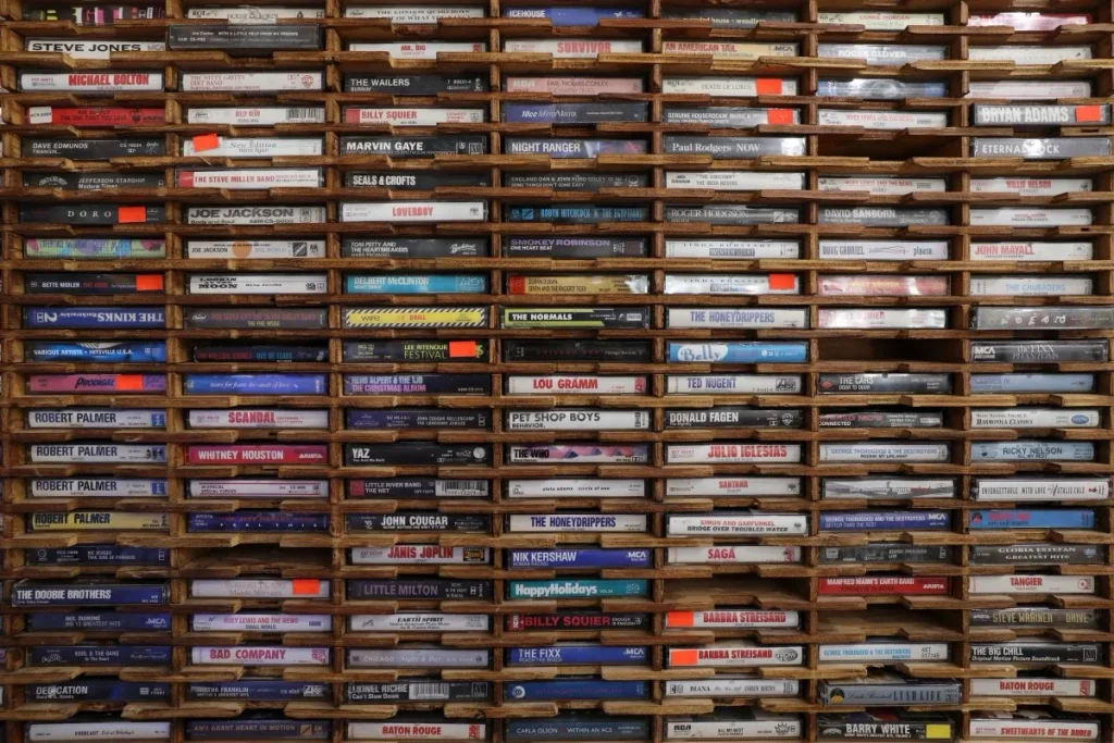 A large archive of tapes organised on shelves